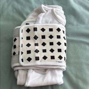 Baby sleep sacks and bands from Nanit  one is 0-3 months the other is 3-6 month